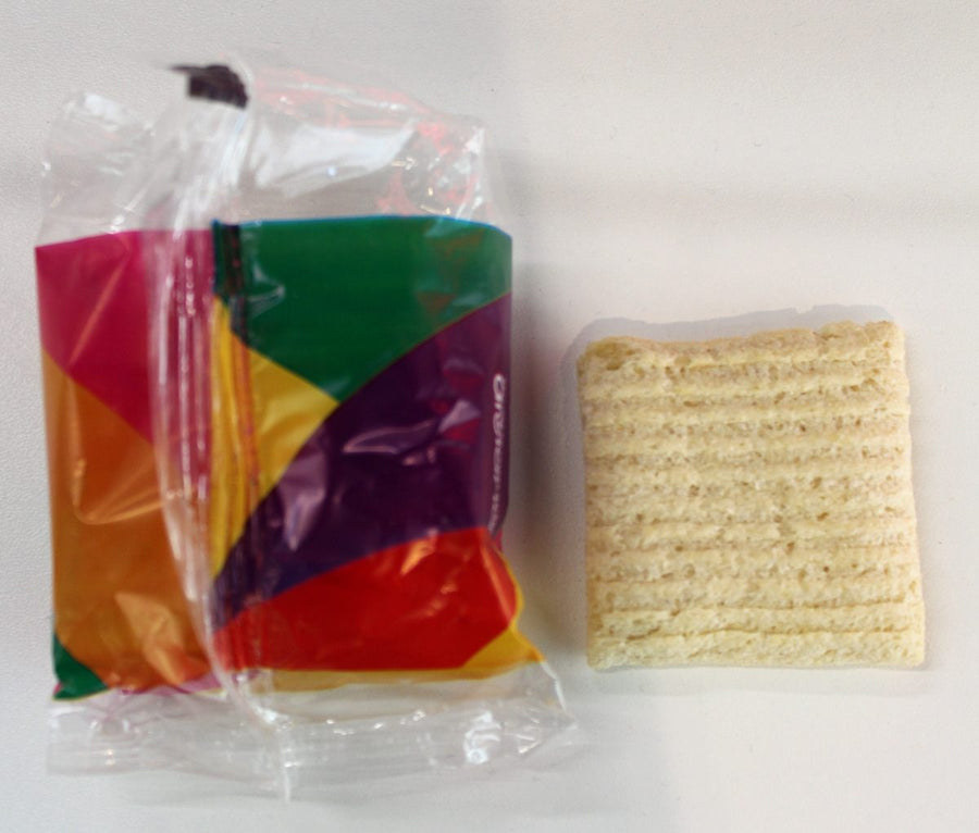 Mini pacote de TostiQ e uma torrada de quinua, do tamanho da lancheira